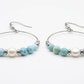 Orecchini Larimar e Perla fondo bianco